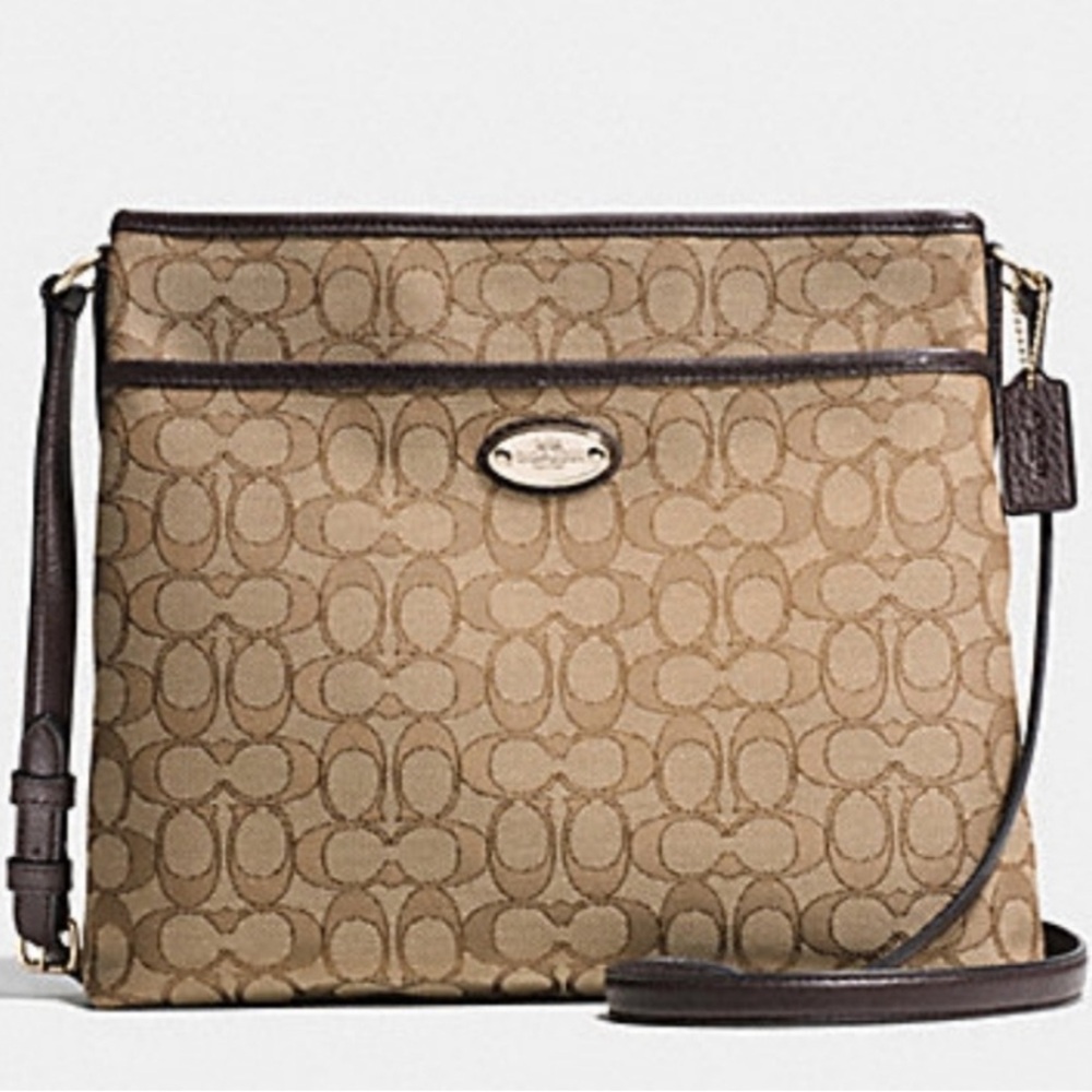 Coach crossbody canvas brown and Tan with leather trim.